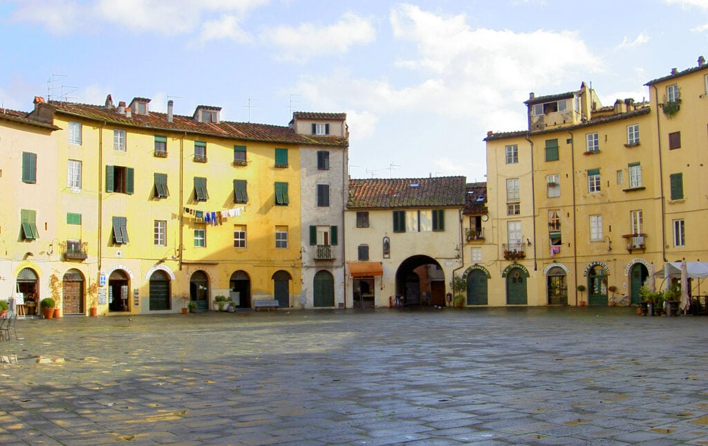 Roman Coliseum reflected in Lucca's Piazza