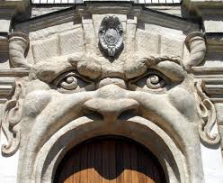 Angry monsters decorate this palazzo.